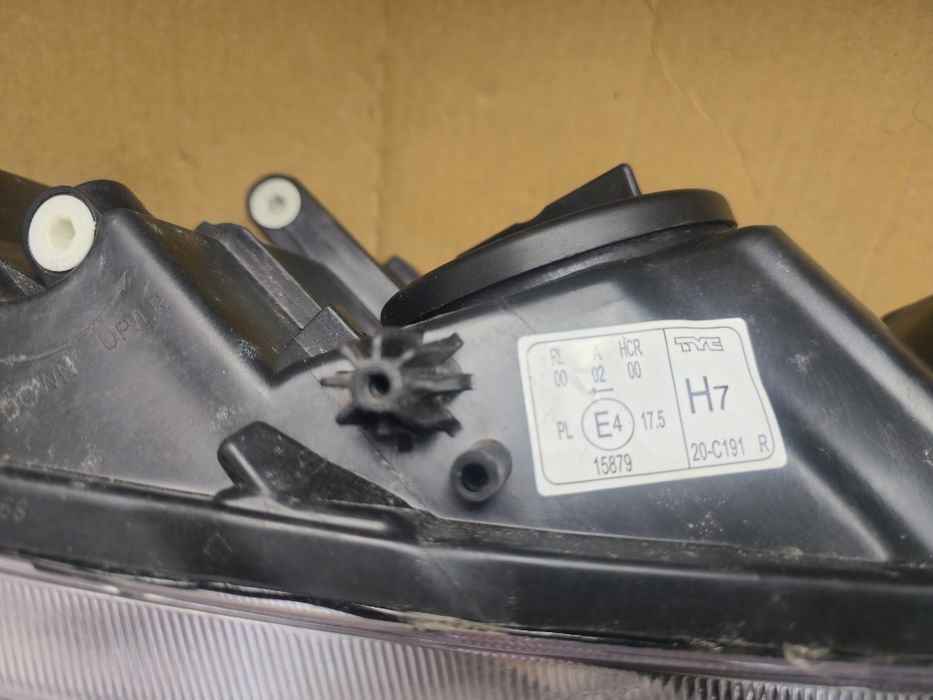 Farol Opel Astra 2011
