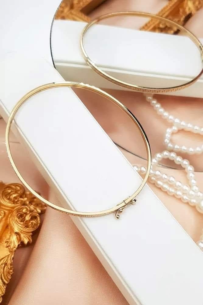Bransoletka złota diamentowana. Bangle. Wzór grecki