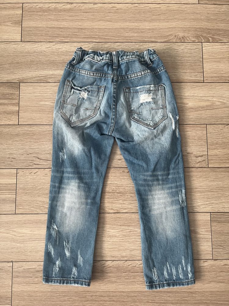 Fashion Jesns modne szarpane jeansy rozmiar 104/116cm.