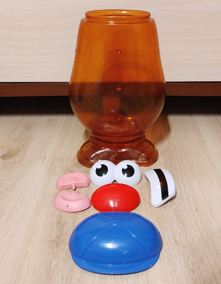 Pojemnik na zabawkę ziemniak, bulwa Toy Story. Można doczepiać elem.