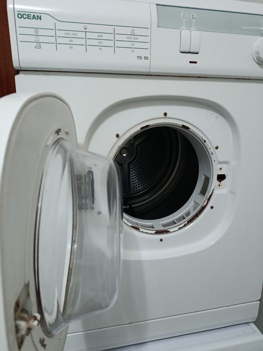 Máquina de secar roupa, usada