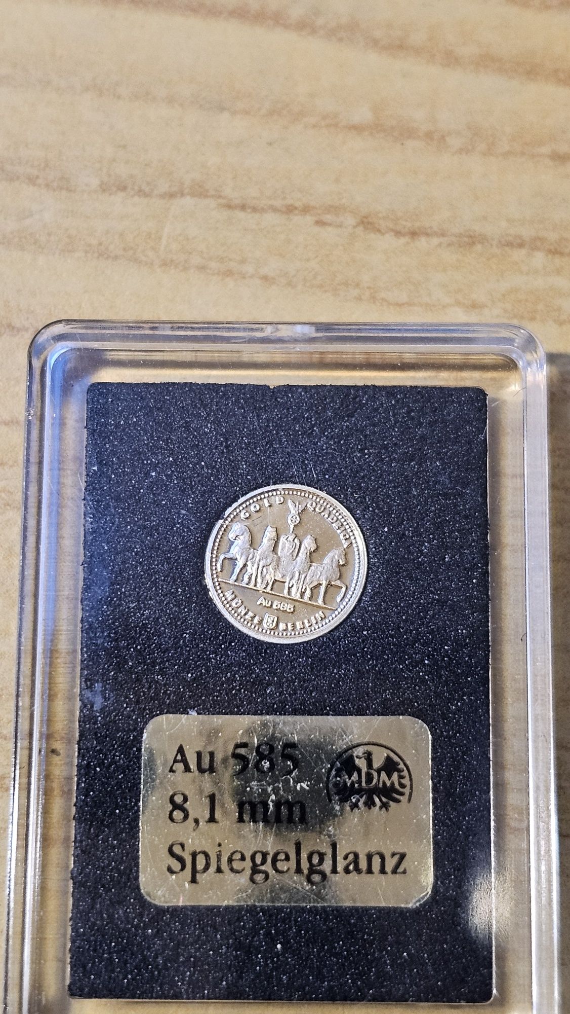 Złota moneta kolekcjonerska Au 585 MDM – Berlin Kwadryga, 8.1 mm  0.3g