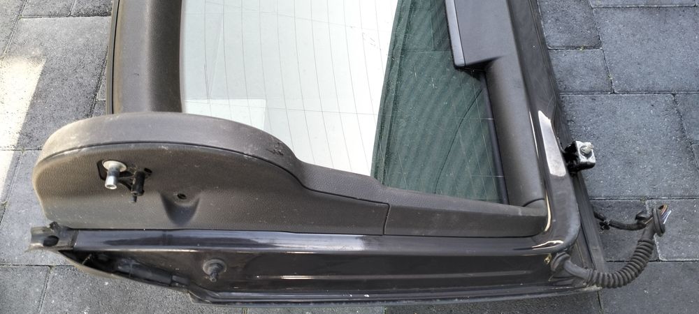 Заднє скло шкода суперб ліфбек 2010рік коричнева