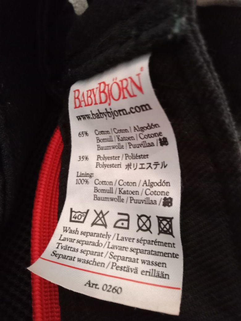 Nosidełko Baby Bjorn  czarne z czerwonymi dodatkami na wzrost od 53 do