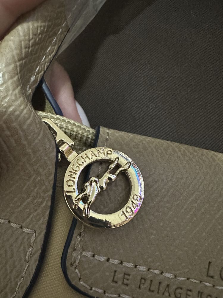 Mala Longchamp creme