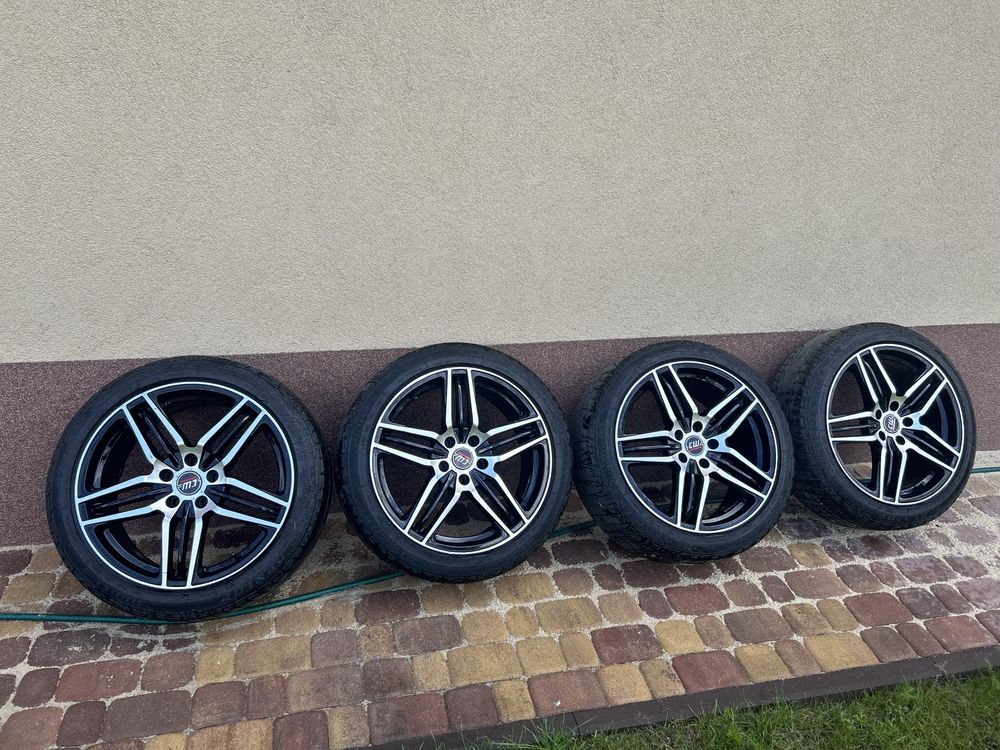 Felgi 18 cali 5x112 z Oponami Dunlop