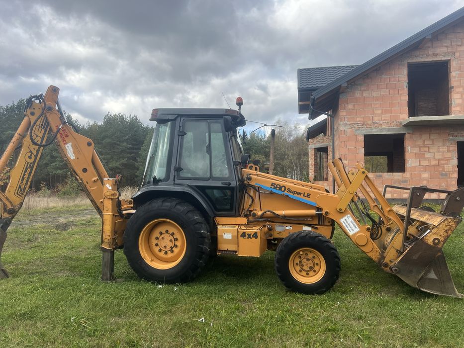 Koparkoładowarka koparka  Case 580 SLE SUPER stan jcb caterpillar