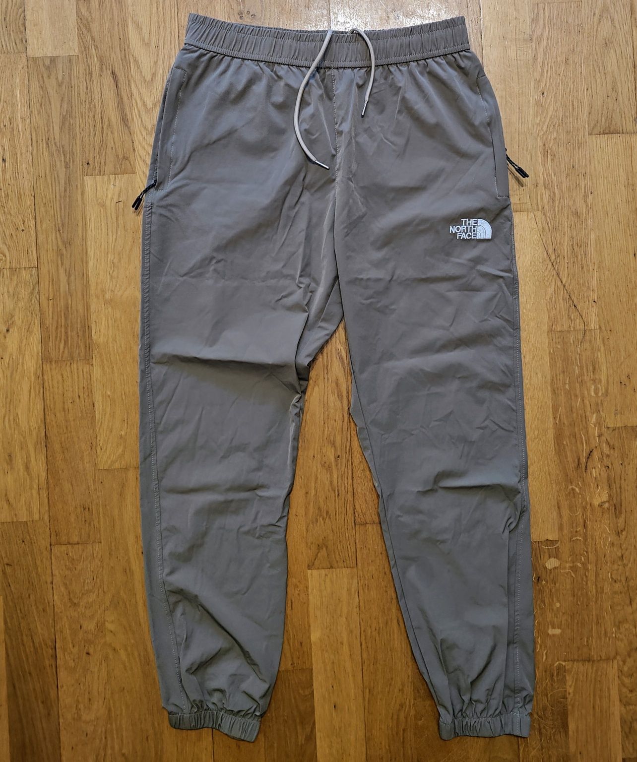 Męskie świetne spodnie The North Face rozmiar M stan bardzo dobry+
