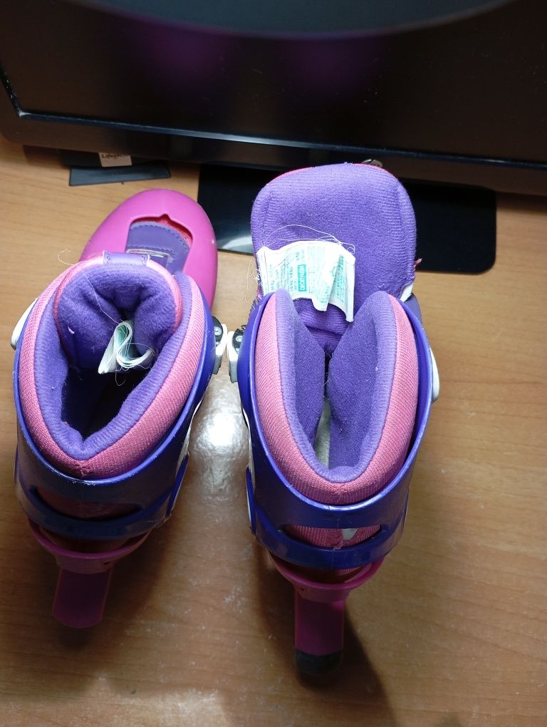Patins em linha rosa