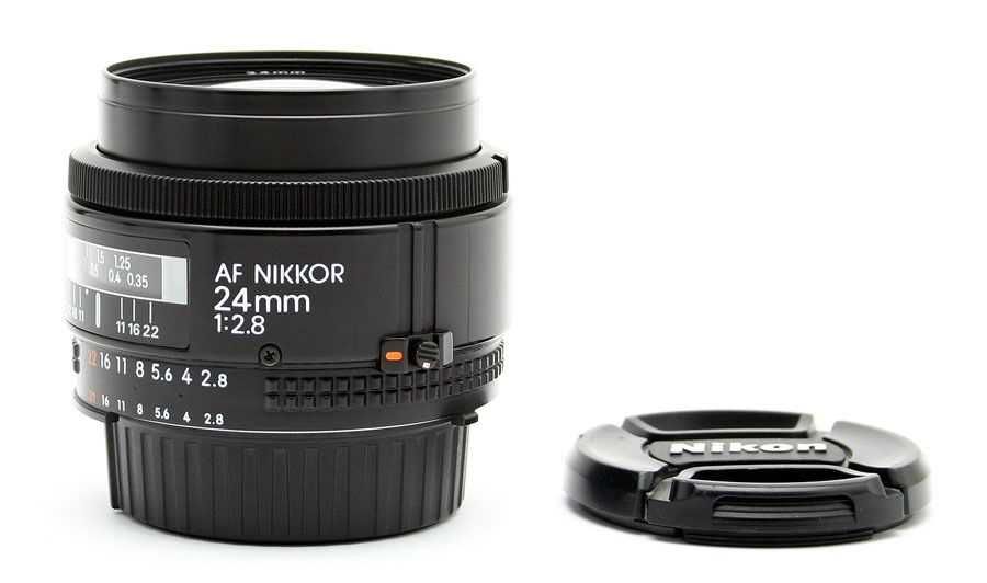 Máquina fotográfica Digital Nikon D7100 + objetiva AF Nikkor 24mm f2.8
