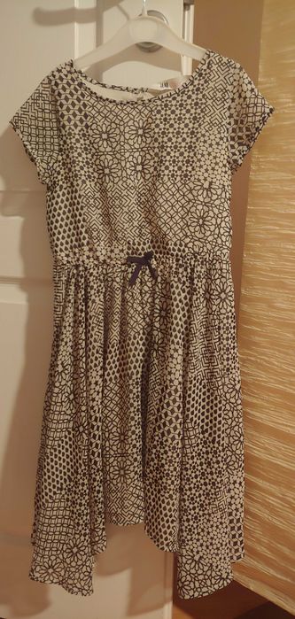 Piękna przewiewna sukienka rozm.128