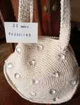 Bolsa em crochê ornamentada