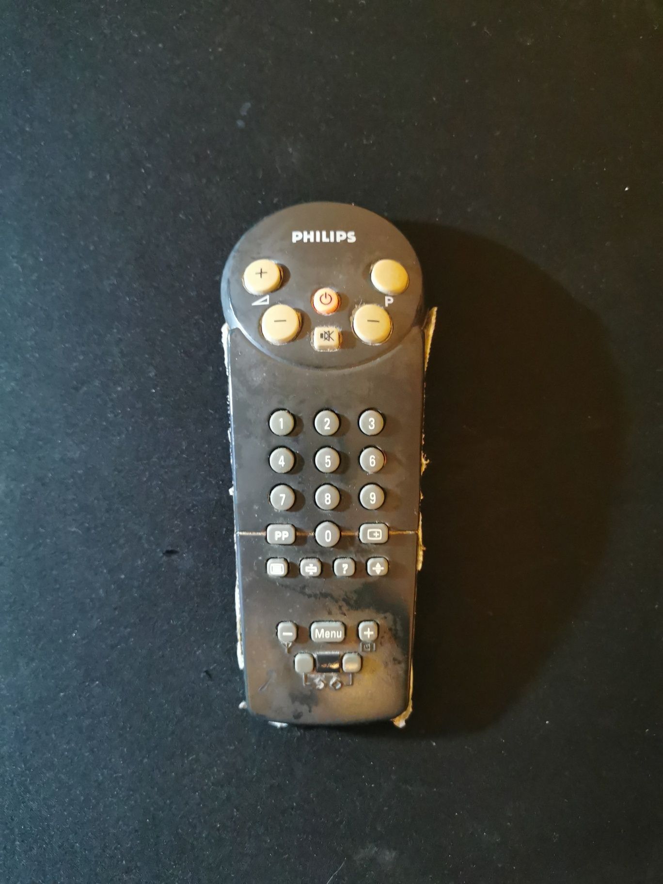 Televisão Philips a funcionar com comando