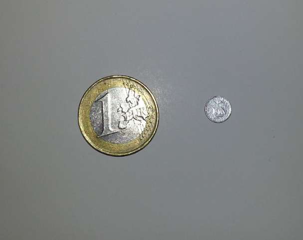 Miniatura de moeda de cinco escudos