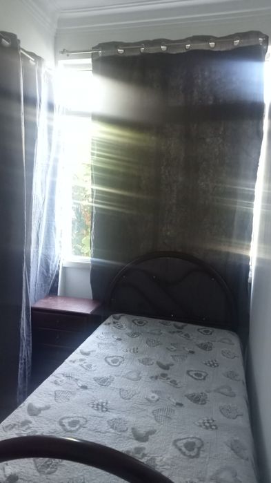 Quarto a dois minutos a pé da praia