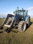 New holland ts110 z ładowaczem
