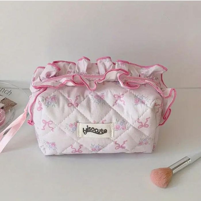 Маленька містка дорожня косметичка з бантом