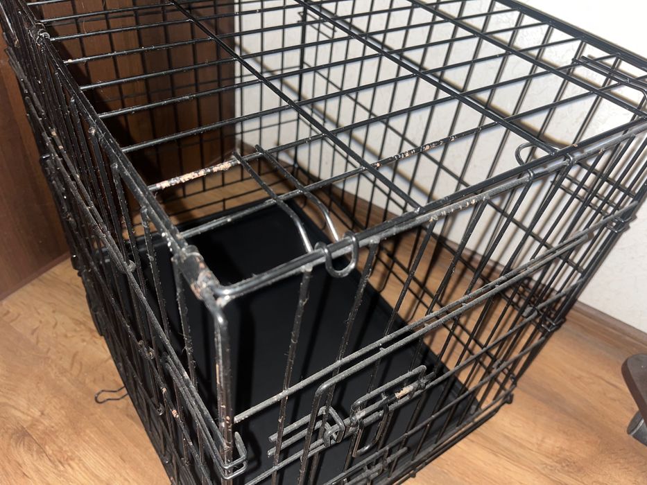 Металическая клетка для собак