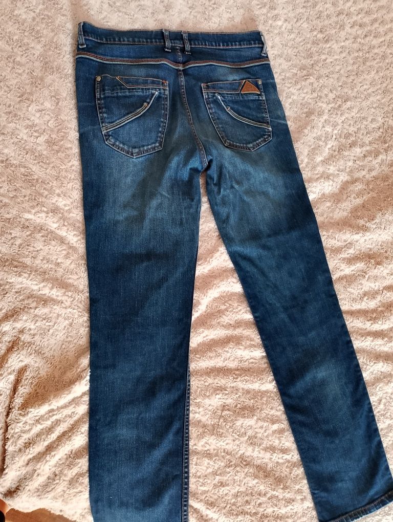 Spodnie 32 L męskie chłopięce z przetarciami Dakota jeansy