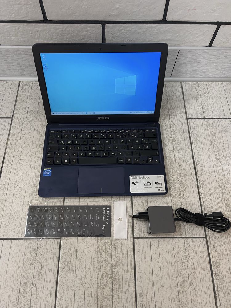 нетбук asus f205t