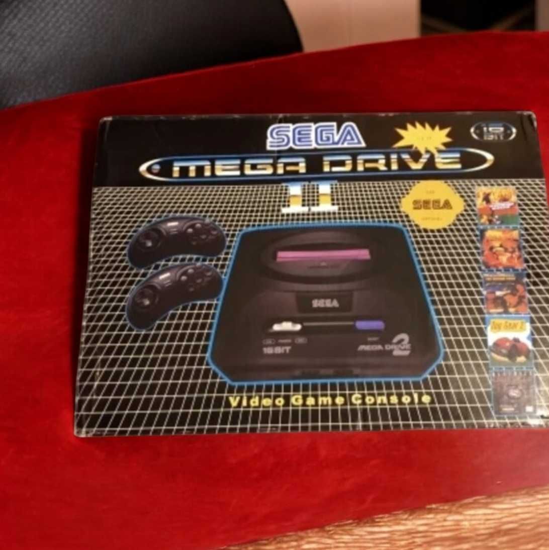 Пиставка ігрова для тєліка sega с играми 2 джойстика