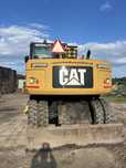 Caterpillar M 313D rototilit
