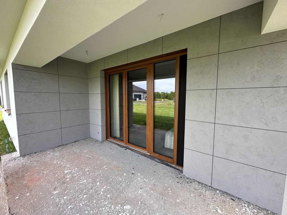 Beton architektoniczny tynki dekoracyjne elewacja płyty mikrocement