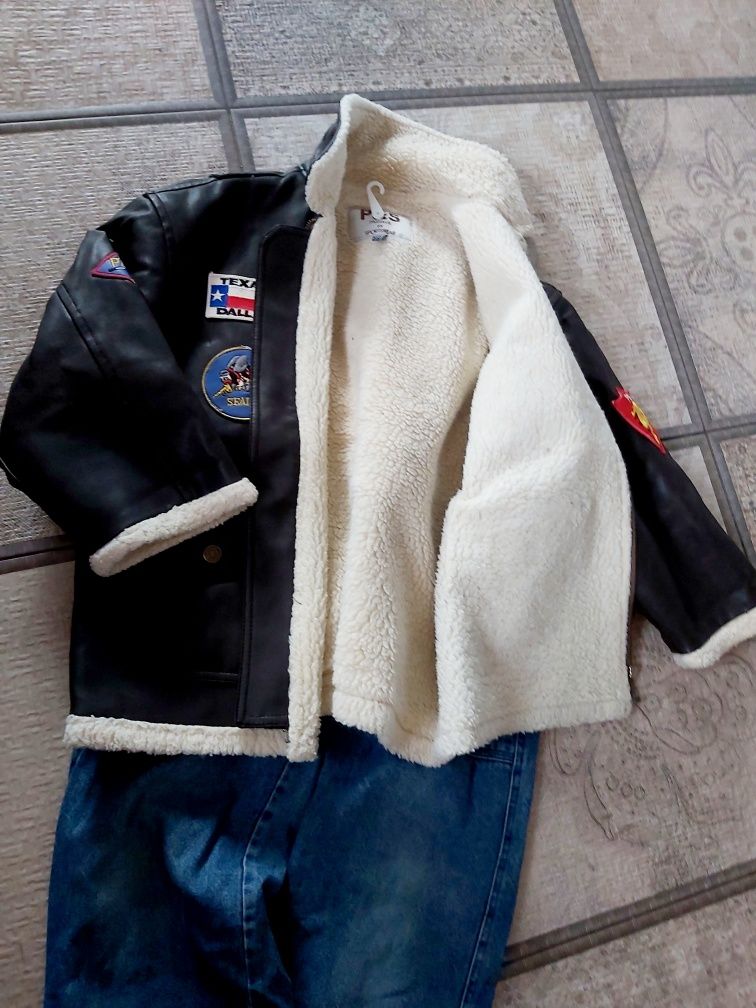 Зимові куртка та джинсы на 7-9 років