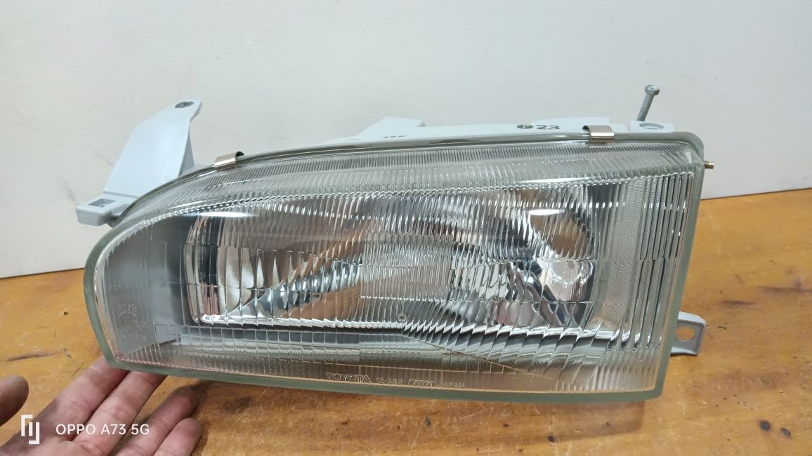 Farol Toyota Corolla ótica 1989 esquerdo