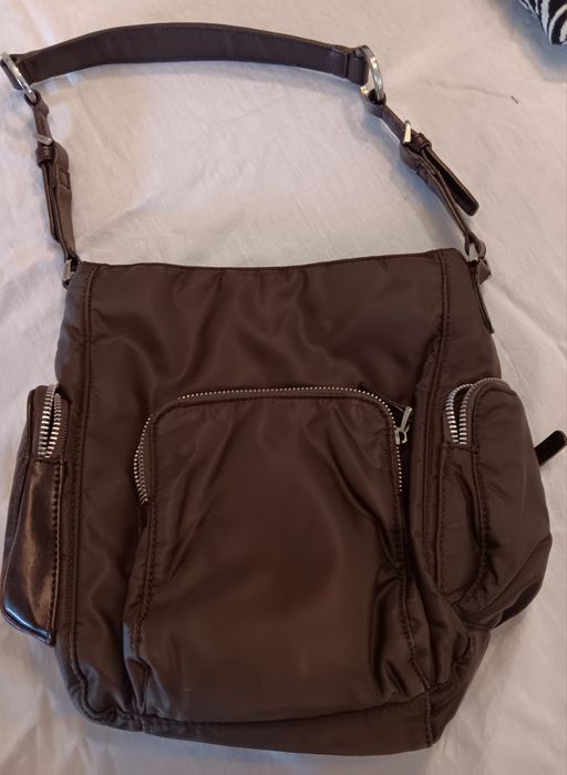 Mala em tecido impermeavel e pele sintetica ,marca parfois .