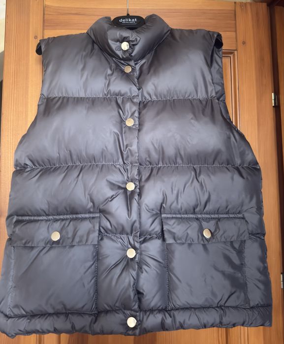 Стильна жіноча жилетка