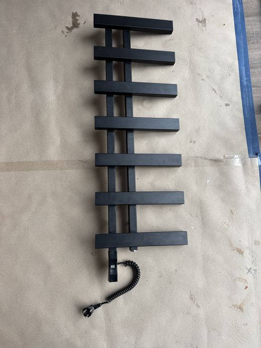 Плотенцесушка електрична нова (1м/35см)