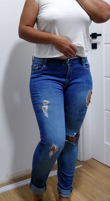 Jeansy z rozdarciami 40