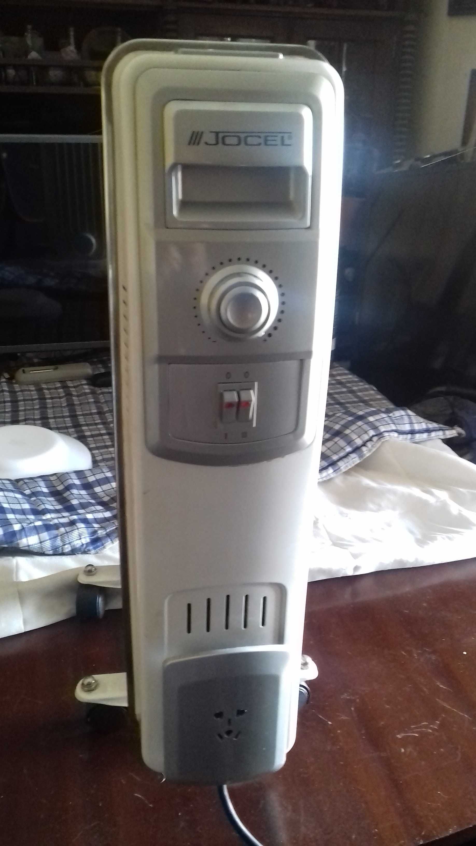 vendo aquecedor a óleo marca jocel 2000w a funcionar