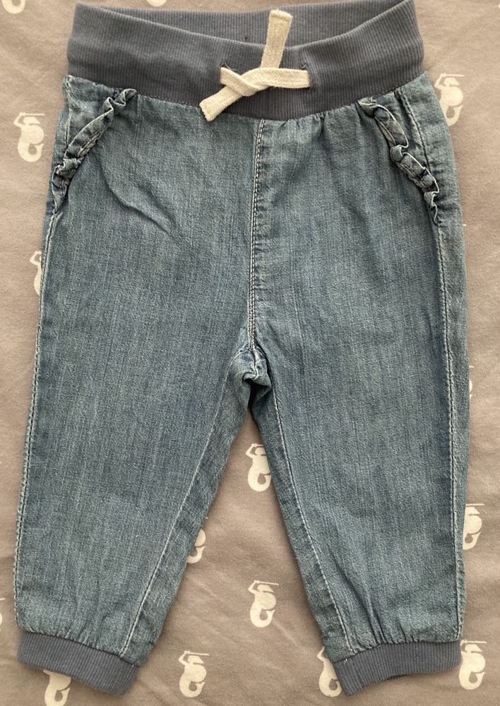 spodnie z falbanką (miękkie) jeans - H&M r. 74