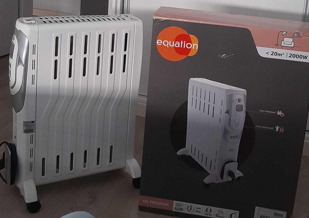 Aquecedor a óleo semi-novo.