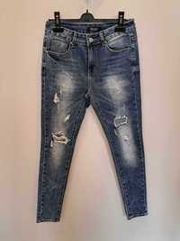 Spodnie jeans damskie, przedzierane roz. S