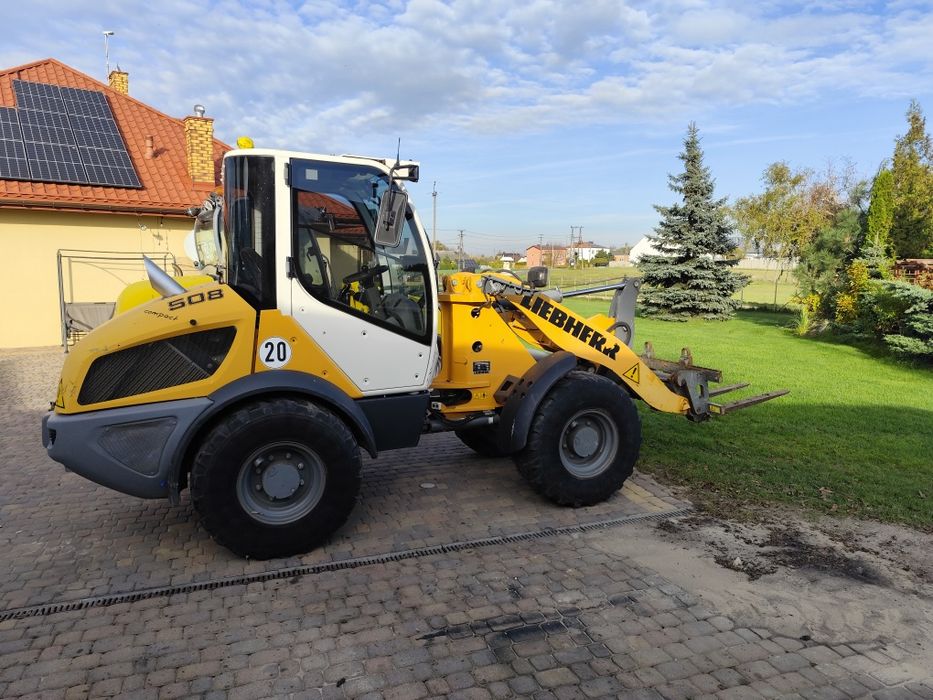 Ładowarka liebherr 508 cat jcb