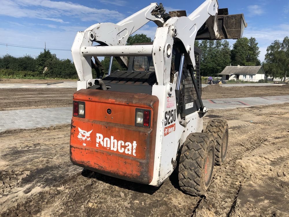 Bobcat s250 бобкет jcb. Міні навантажувач
