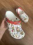 Дитячі сабо Crocs PEANUTS CLASSIC CLOG KIDS 30 Білі в принт 208630