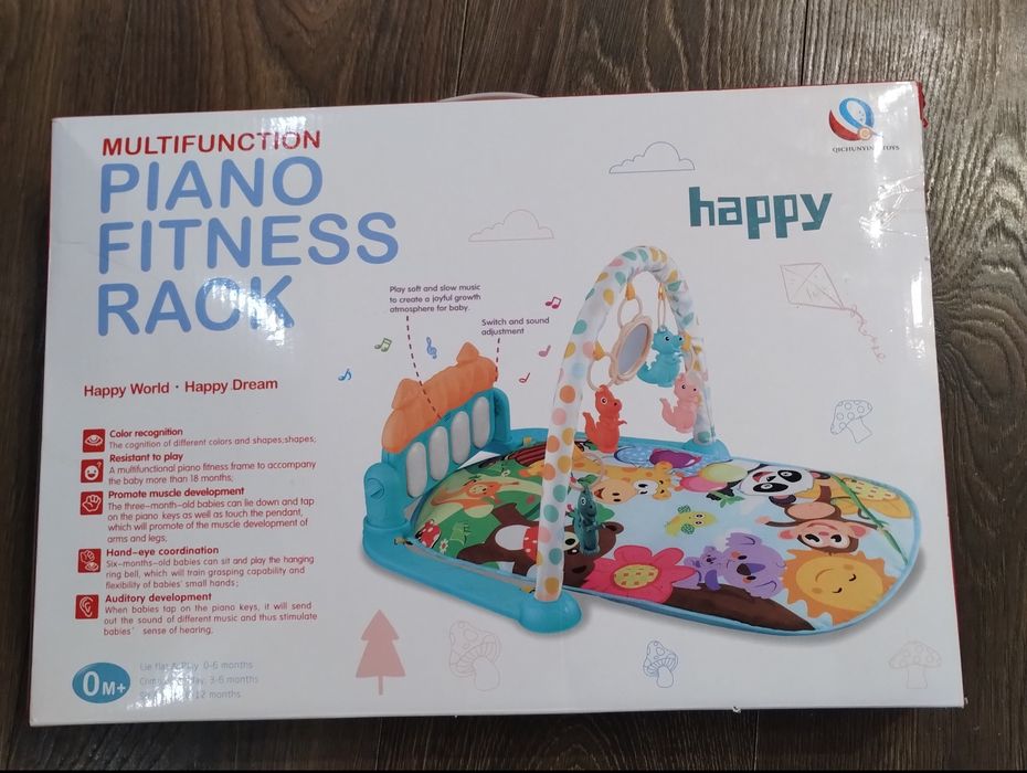 Дитячий килимок з піаніно і підвісками,звукові та світлові ефекти.