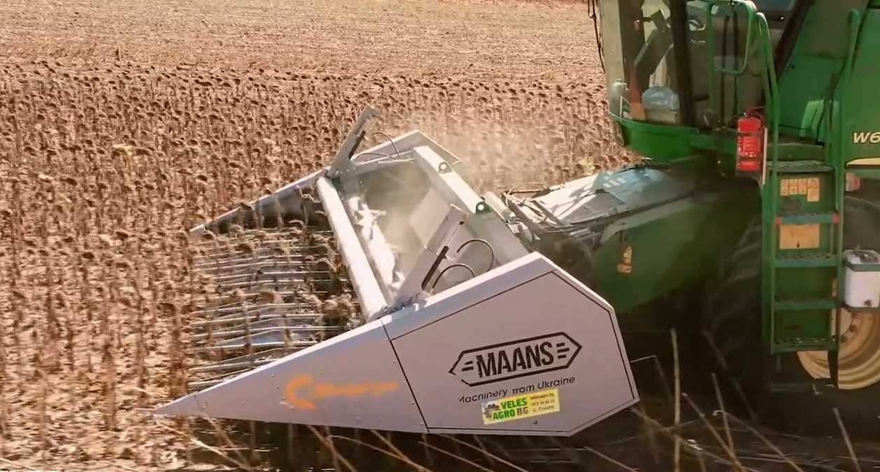 Жатка соняшникова Maans S під Клаас, Нью Холланд (Claas, New Holland).