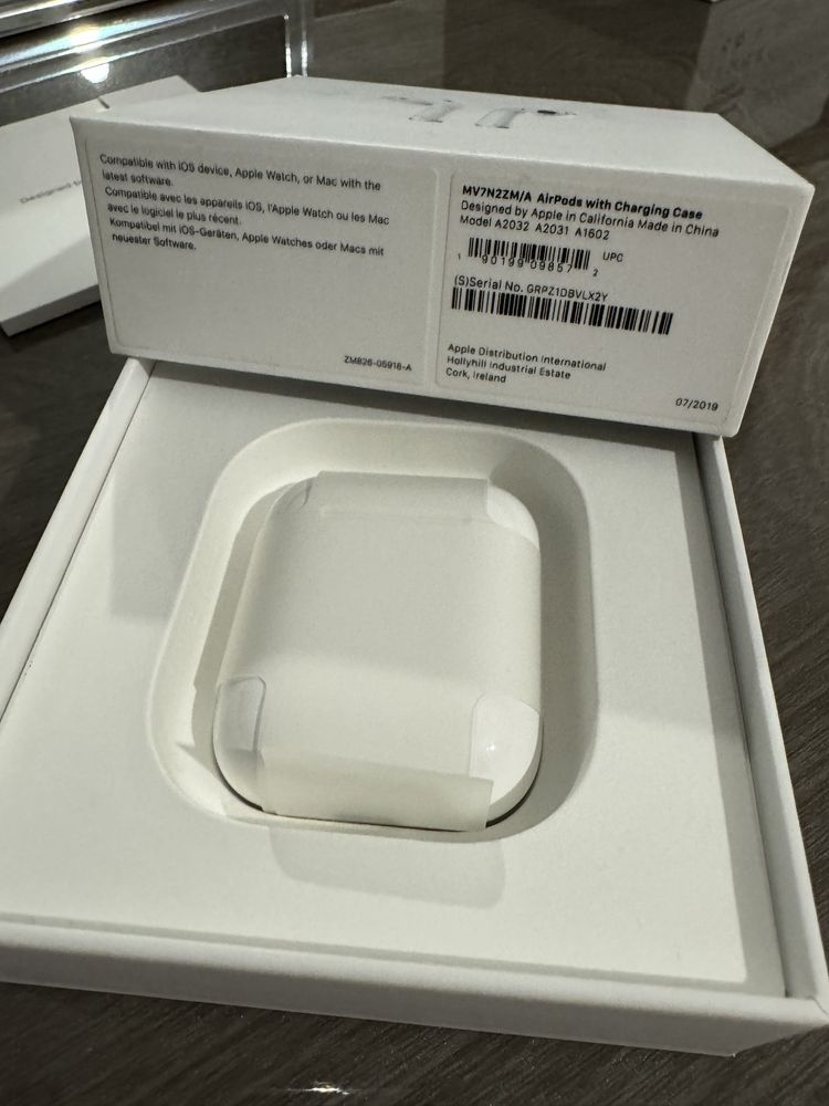 AirPods with Charging Case + case