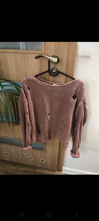 Sweter z dziurami różowy