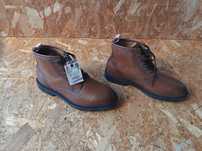 Botas em pele homem novas