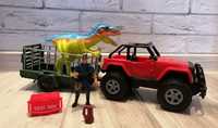 Samochód Dżip Jurassic World z przyczepą i dinozaurę