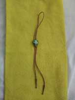 Krawat kowbojski tzw.bolo tie.
