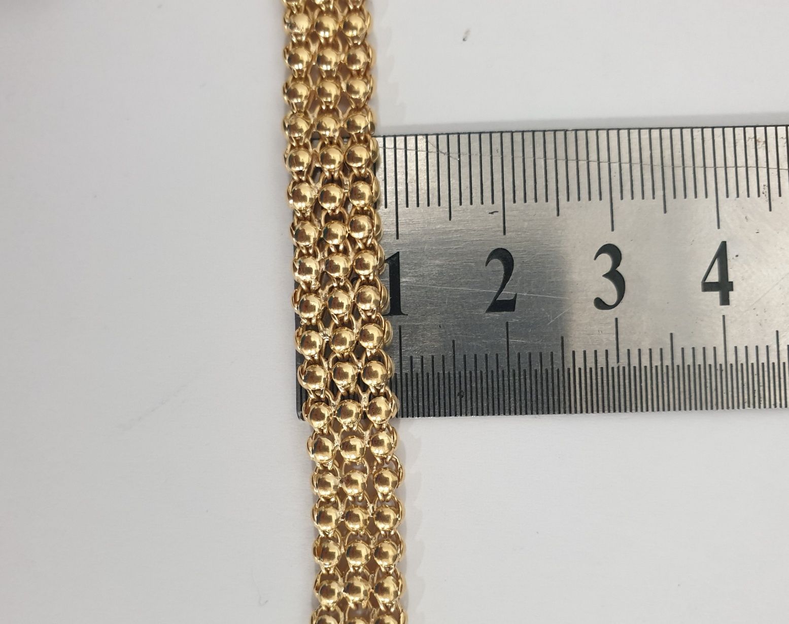Pulseira ouro tapete