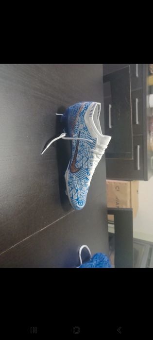 Chuteiras CR7 Pitons FG