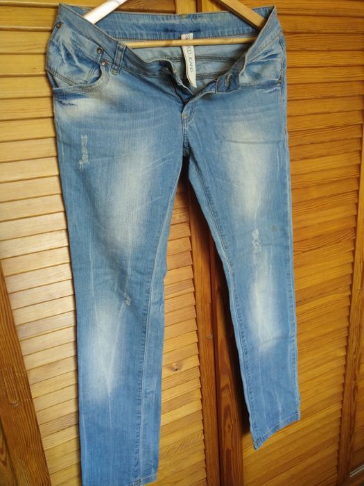 Jeansy damskie Reserved